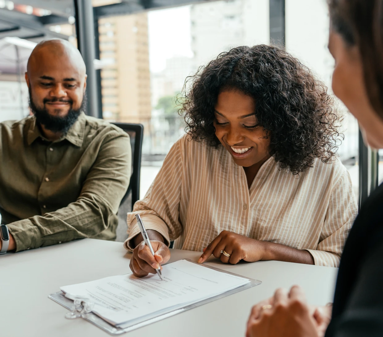 Business team reviewing paperwork together